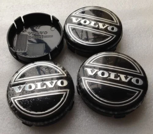 4 tapabujes en negro para Volvo de 64mm